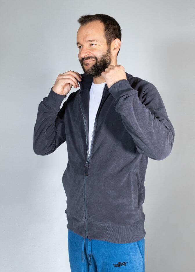 man wearing nuffinz towel jacket ebony grey smiling