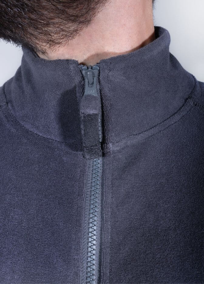 man wearing nuffinz towel jacket ebony grey beard closeup zipper